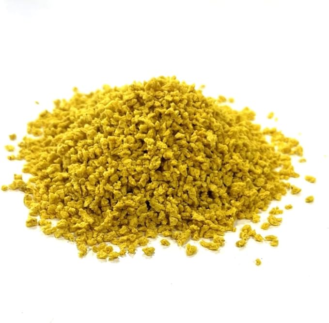 Countrywide Premium Canary and Yellow Biscuit Mix bird feed in a bag, with colorful bird treats and mixed grains for canaries.