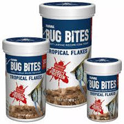 Fluval Bug Bites tropical fish flakes in a clear container, designed for feeding freshwater tropical aquarium fish.