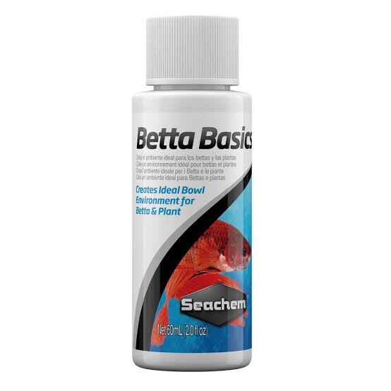 Seachem Betta Basics 60ml pH buffer bottle, used to stabilize water pH for betta fish tanks, with the product label visible.