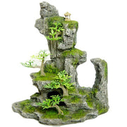 Tall Rock Formation With Plant