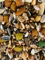 Countrywide VAM Parrot bird feed with low sunflower mix, showing colorful bird seed blend in a clear bag.